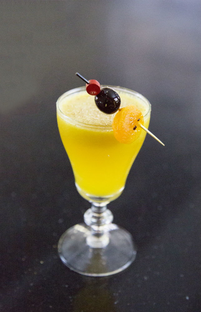 Orange Cocktail with apricot garnish