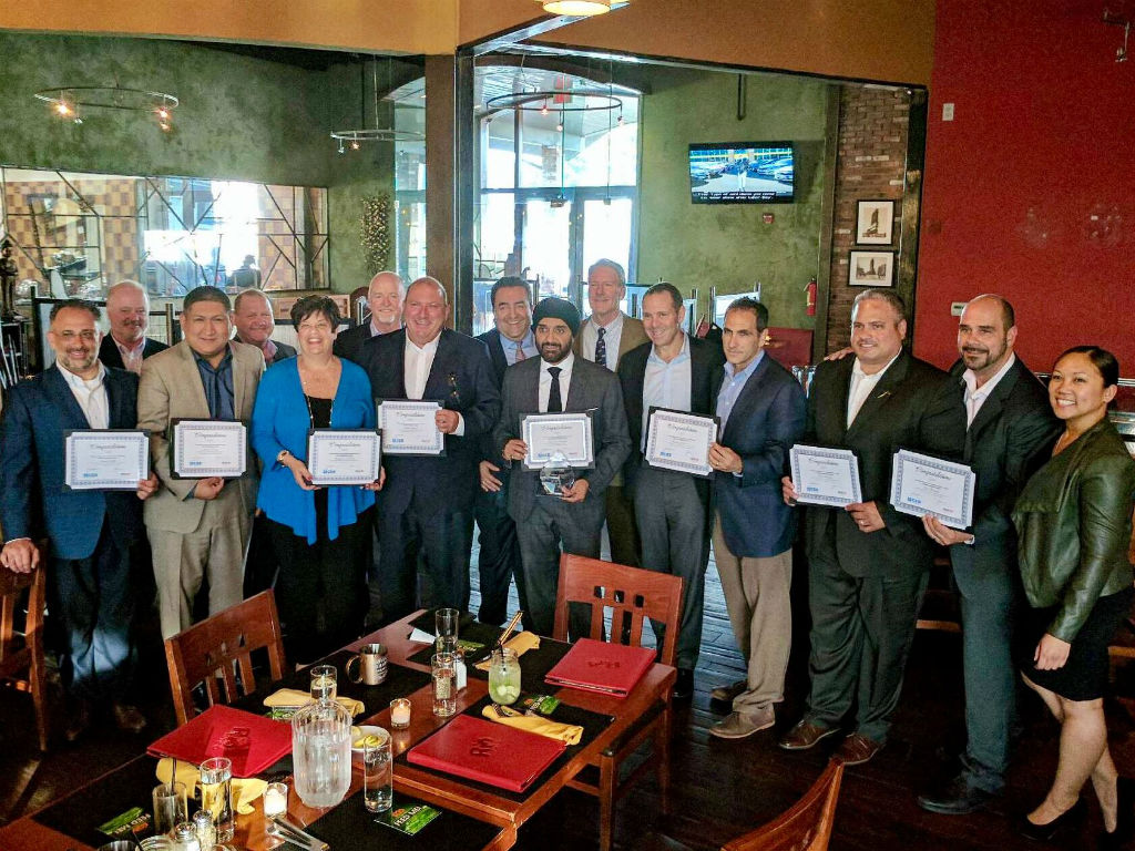 Group photo of Breakthru NJ's 2016 Certified Coaches at awards dinner