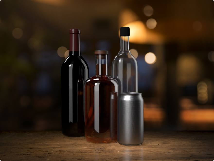 bottles of alcoholic beverages on a wood table