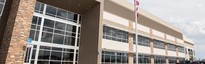 beige brick and glass office building