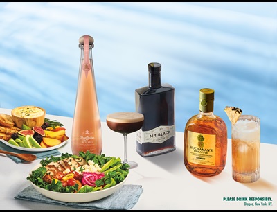 Four bottles from Diageo Spring Flavors collection next to food
